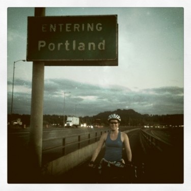 Stephanie Dost biking on highway